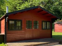 Camping Goudal 12 FOTO chalet devant bijlage 1 200x150
